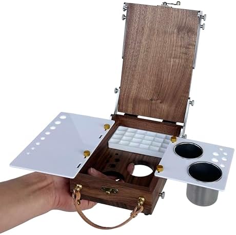 tabletop easel box with watercolor palette empty, portable shown in use