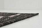 unique loom outdoor border collection area rug on a desk or shelf