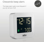 braun digital travel alarm clock with snooze, compact shown in use