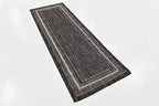 unique loom outdoor border collection area rug, side view