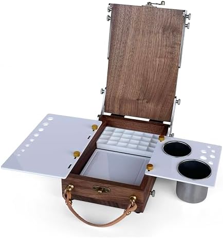 tabletop easel box with watercolor palette empty, portable, close-up detail