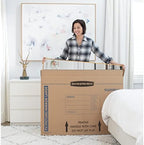 bankers box 4-pack medium tv/picture/mirror moving boxes on a desk or shelf