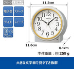 seiko clock kr518s alarm clock, automatic lighting, analog shown in use