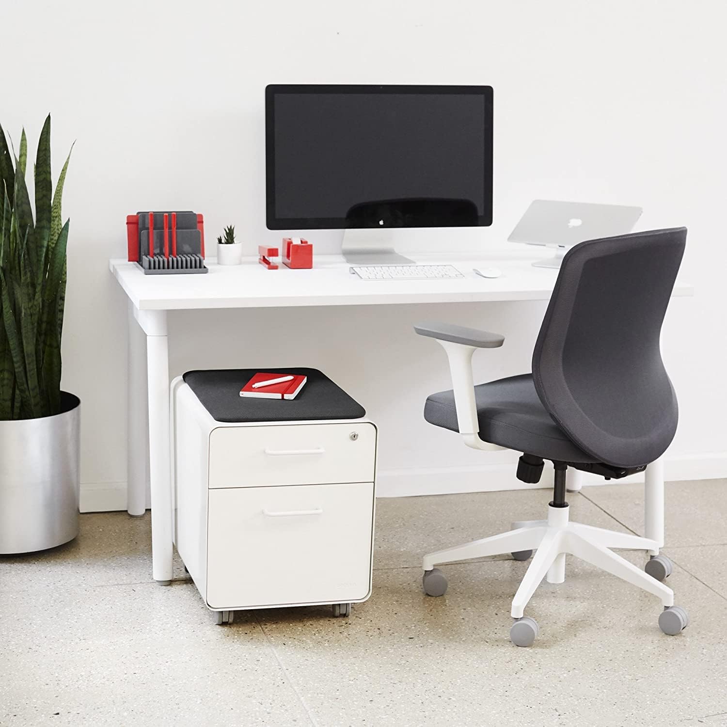 Poppin Mobile Mini Sittable Stow Rolling File Cabinet - White with Dark Gray Seat Cushion. Two Locking Drawers and One Key Lock. Two Keys Included. One Utility Drawer and One Hanging File Drawer