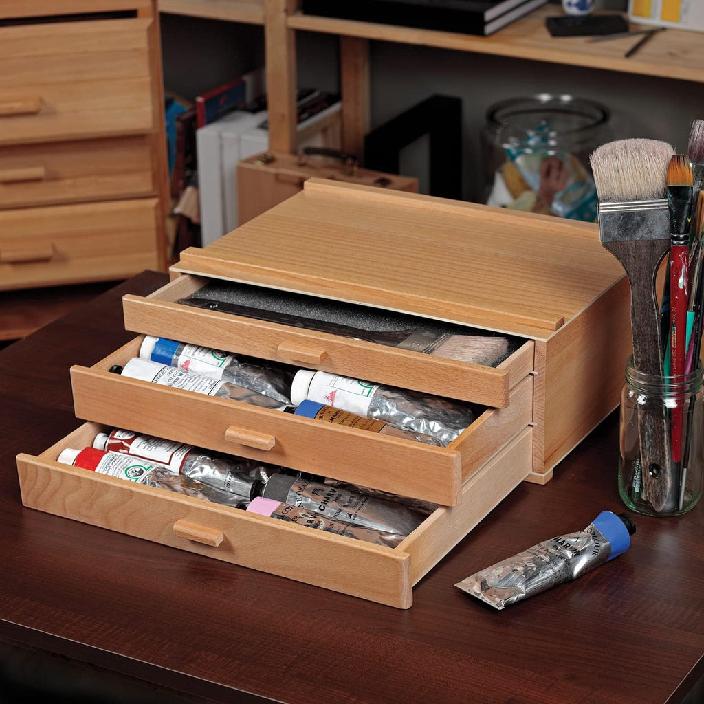hg art concepts artist storage chest, wooden brush on a desk or shelf