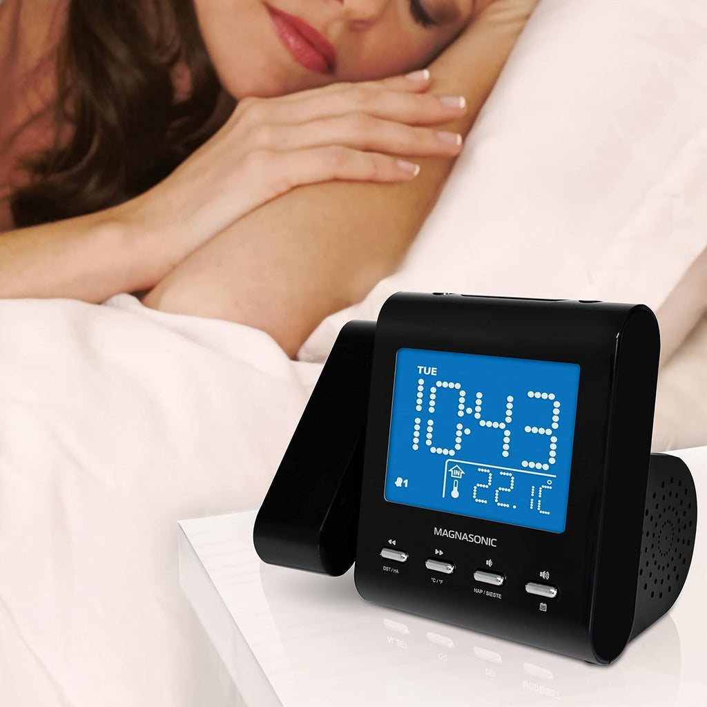 magnasonic projection alarm clock with am/fm radio, battery on a desk or shelf