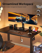perlegear dual monitor stand with power strip, freestanding on a desk or shelf