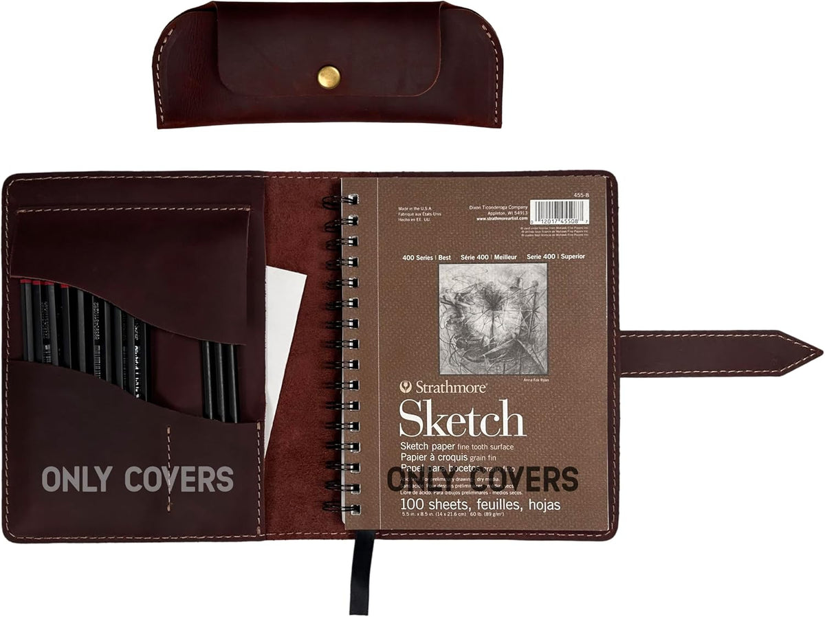 leather sketchbook cover for 5.5 x 8.5 sketchbook shown in use