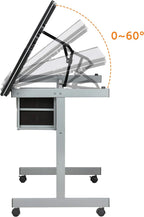 Yaheetech Glass Drafting Table with Storage, Adjustable Art Drawing Desk | Tempered glass top on a steel frame tilts 0-60° for drawing, tracing, or diamond art, plus two fabric drawers and side trays.