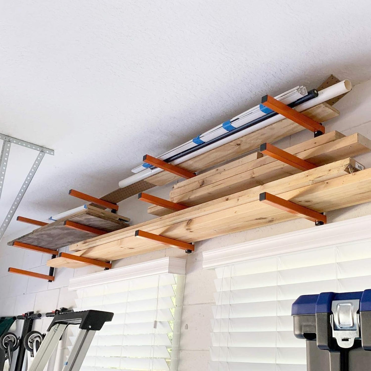 ultrawall wall mount wood organizer and lumber storage shown in use