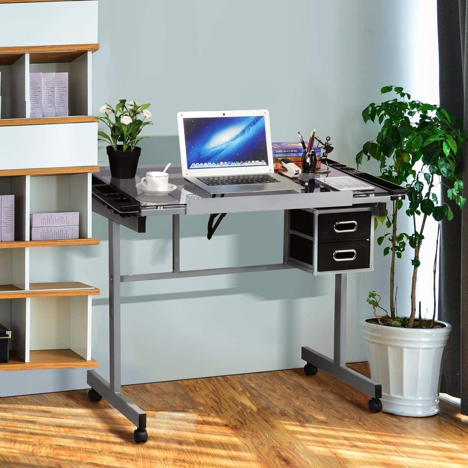 Yaheetech Glass Drafting Table with Storage, Adjustable Art Drawing Desk | Tempered glass top on a steel frame tilts 0-60° for drawing, tracing, or diamond art, plus two fabric drawers and side trays.