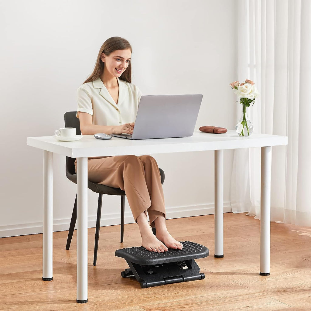 huanuo adjustable foot rest for under desk with shown in use