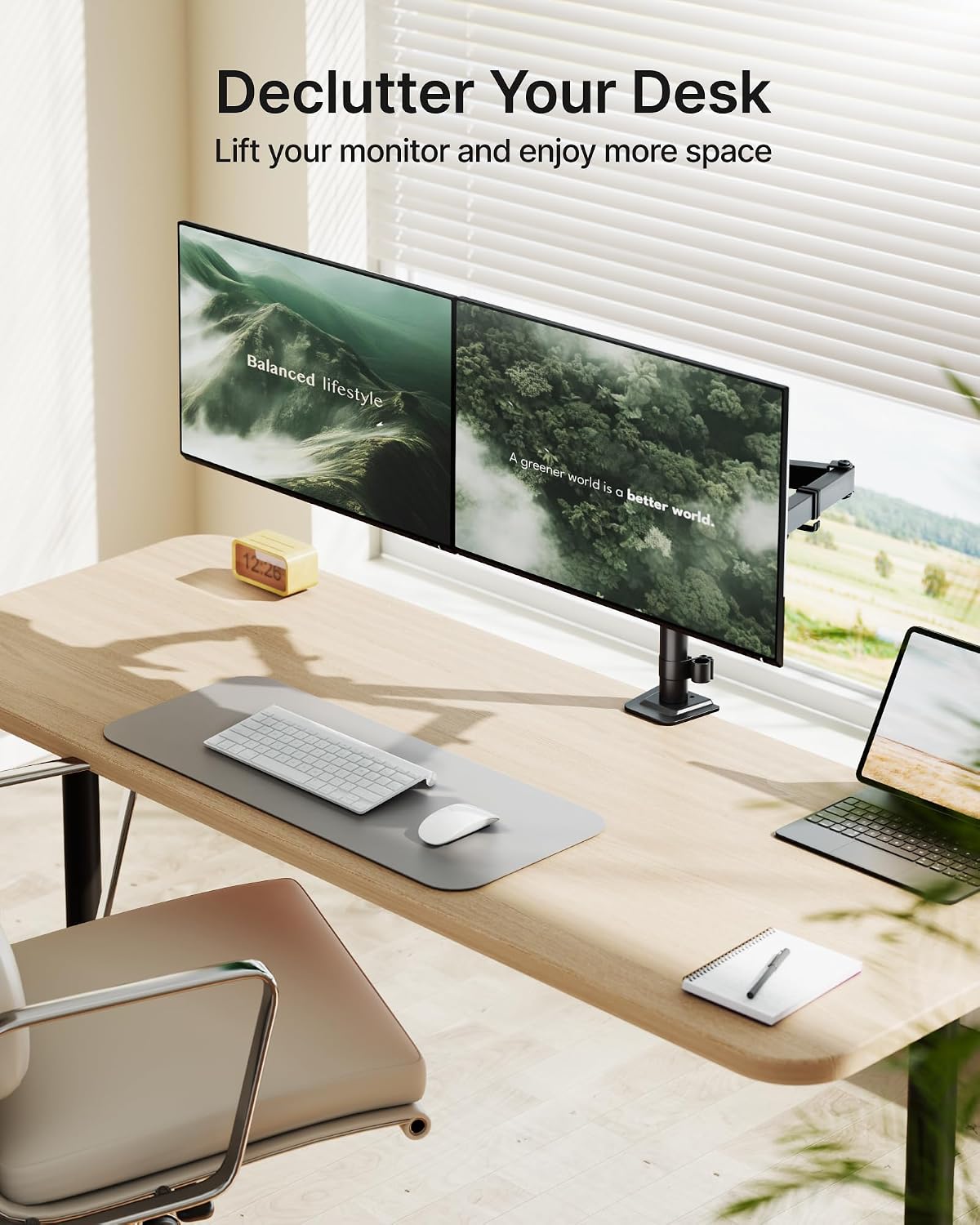 montek heavy-duty dual monitor stand for 17-32", 22 shown in use