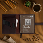 leather sketchbook cover for 5.5 x 8.5 sketchbook on a desk or shelf