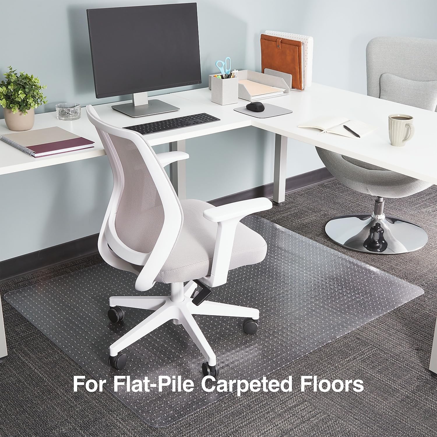 Staples Office Chair Mat, Clear Floor Mats, Flat-Pile Carpets, 60 x 46 Inch, Smooth Glide | Smooth-glide protection for desk chairs on flat-pile carpeted floors.