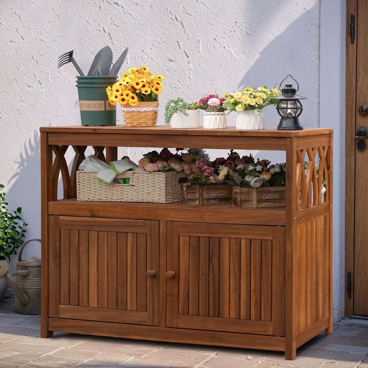 greesum 2‑tier acacia wood outdoor storage cabinet with shown in use