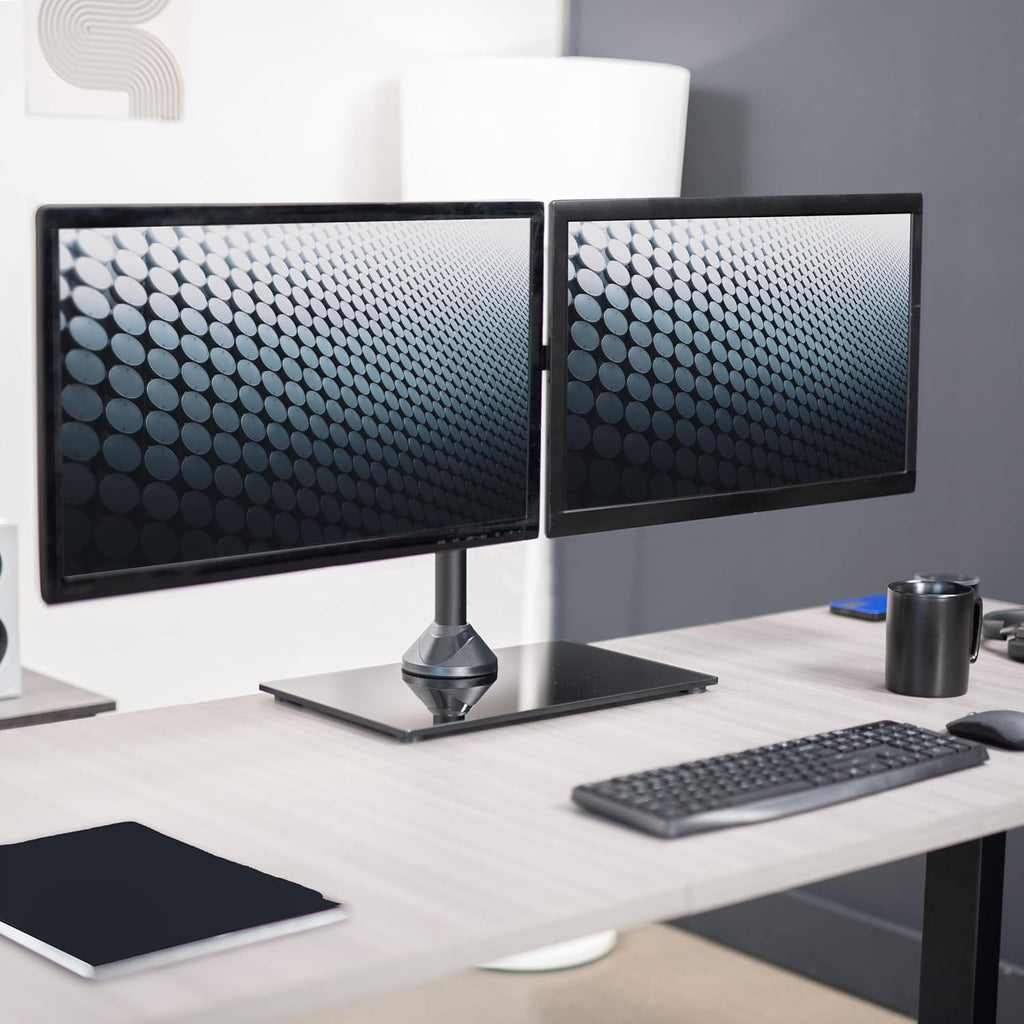 vivo freestanding dual monitor stand with sleek glass shown in use