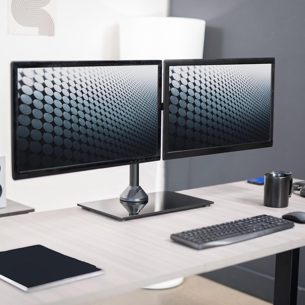 vivo freestanding dual monitor stand with sleek glass shown in use