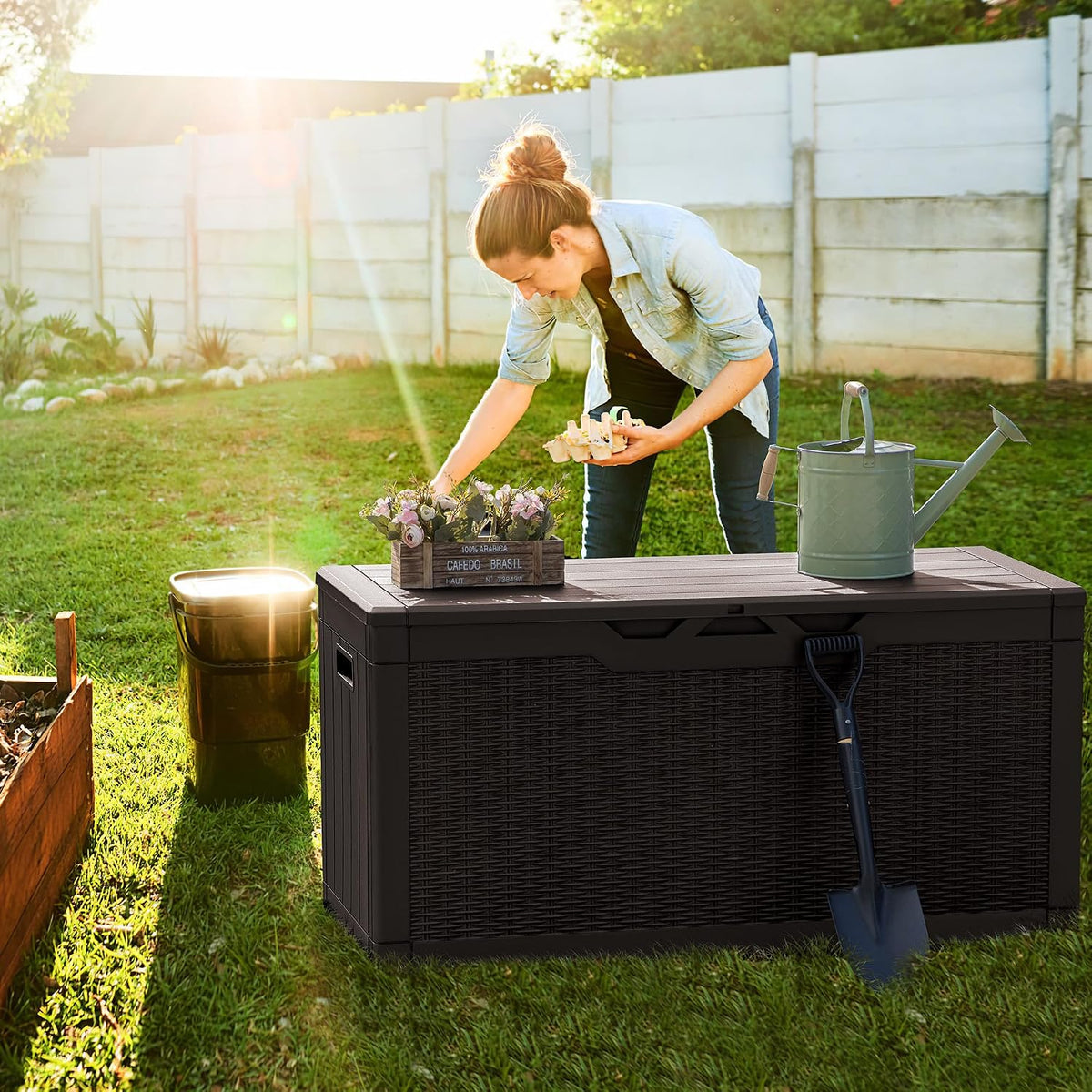 greesum 100 gallon resin deck box large outdoor shown in use